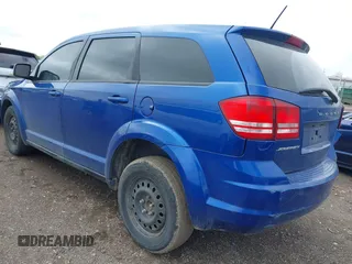 2015 Dodge Journey SE z VIN 3C4PDCAB8FT552555, wystawiony jako IAAI lot #42195398 z przebiegiem 149 503 mil mil oraz . Historia ofert i sprzedaży dostępna na DreamBid. Obrazek 3.