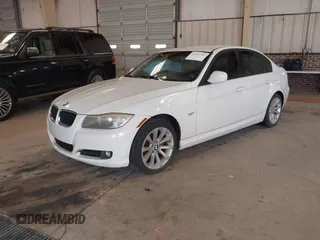 2011 BMW 3 Series 328i with VIN WBAPH7G55BNN02281, listed as a IAAI auction lot 41357797 with 118,224 mi miles. Bid and sale history available at carsss.com. Image 2.