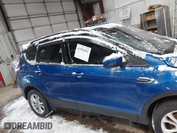 2017 Ford Escape SE with VIN 1FMCU9GD0HUD61453, listed as a IAAI auction lot 41596562 with 173,803 mi miles and . Bid and sale history available at DreamBid. Image 13.