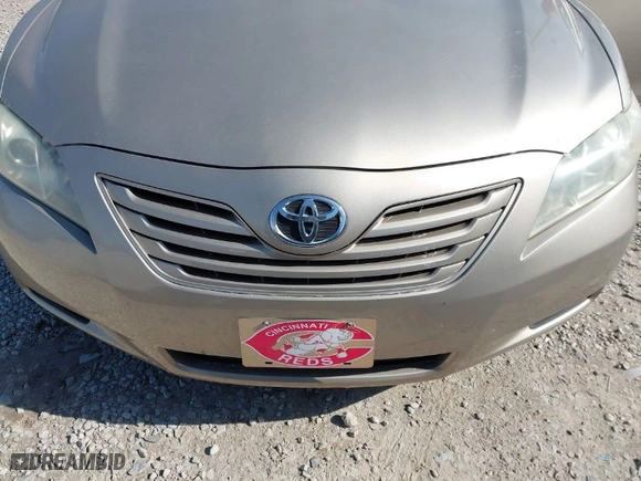 2007 Toyota Camry CE with VIN 4T1BE46K57U082347, listed as a IAAI auction lot 42004676 with 107,000 mi miles. Bid and sale history available at carsss.com. Image 6.