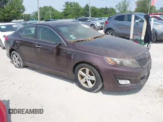 2014 Kia Optima LX z VIN 5XXGM4A72EG278278, wystawiony jako IAAI lot #42409259 z przebiegiem 135 858 mil mil oraz . Historia ofert i sprzedaży dostępna na DreamBid. Obrazek 1.