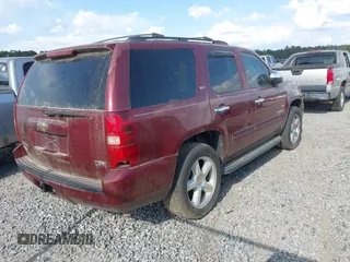 2008 Chevrolet Tahoe 2LT with VIN 1GNFC13098J102381, listed as a IAAI auction lot 41962017 with 258,038 mi miles and . Bid and sale history available at DreamBid. Image 4.