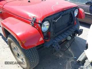 2014 Jeep Wrangler Sahara with VIN 1C4AJWBG0EL109773, listed as a IAAI auction lot 41678412 with 12,264 mi miles and . Bid and sale history available at DreamBid. Image 18.