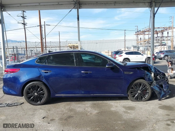 2018 Kia Optima SX with VIN 5XXGV4L29JG208284, listed as a IAAI auction lot 41765005 with 77,189 mi miles. Bid and sale history available at carsss.com. Image 14.