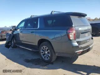 2021 Chevrolet Suburban LT with VIN 1GNSKCKD4MR482940, listed as a Copart auction lot 77072314 with 61,739 mi miles and Salvage Title. Bid and sale history available at carsss.com. Image 2.