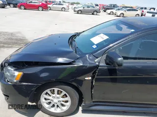2014 Mitsubishi Lancer ES with VIN JA32U2FU9EU014772, listed as a IAAI auction lot 41919896 with 226,996 mi miles. Bid and sale history available at carsss.com. Image 18.