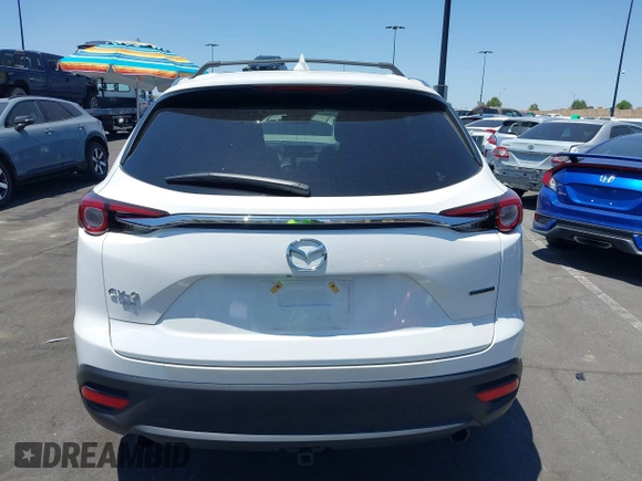 2023 Mazda CX-9 Touring Plus with VIN JM3TCBAY7P0636047, listed as a IAAI auction lot 42309618 with 20,821 mi miles and . Bid and sale history available at DreamBid. Image 16.