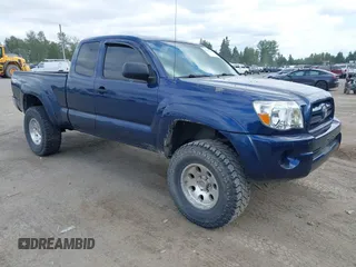2005 Toyota Tacoma z VIN 5TEUU42NX5Z071204, wystawiony jako IAAI lot #42375147 z przebiegiem 196 158 mil mil oraz . Historia ofert i sprzedaży dostępna na DreamBid. Obrazek 1.