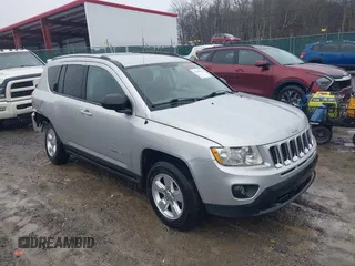 2013 Jeep Compass Sport with VIN 1C4NJCBA8DD264902, listed as a IAAI auction lot 41440255 with 144,877 mi miles. Bid and sale history available at carsss.com. Image 1.