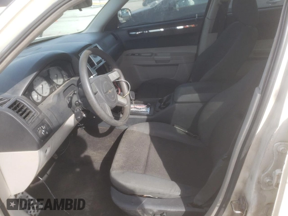 2005 Chrysler 300 with VIN 2C3JA43R25H663094, listed as a Copart auction lot 60813664 with 218,830 mi miles and Salvage Title. Bid and sale history available at carsss.com. Image 7.