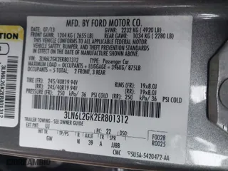 2014 Lincoln MKZ with VIN 3LN6L2GK2ER801312, listed as a IAAI auction lot 41209977 with 152,577 mi miles. Bid and sale history available at carsss.com. Image 9.