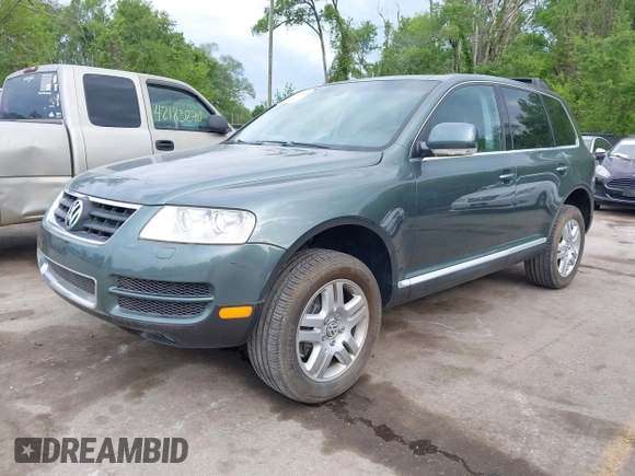 2004 Volkswagen Touareg with VIN WVGCM77L14D045663, listed as a IAAI auction lot 42170895 with 96,709 mi miles and . Bid and sale history available at DreamBid. Image 2.