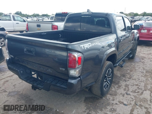 2022 Toyota Tacoma SR5 with VIN 3TMAZ5CN6NM186713, listed as a IAAI auction lot 42607719 with 60,704 mi miles and . Bid and sale history available at DreamBid. Image 4.