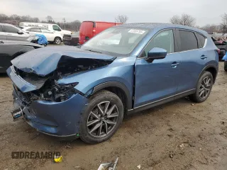 2018 Mazda CX-5 Touring with VIN JM3KFBCM0J0363036, listed as a Copart auction lot 47085755 with 61,928 mi miles and Salvage Title. Bid and sale history available at DreamBid. Image 1.