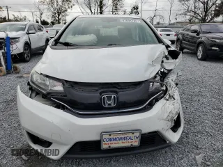 2016 Honda Fit EX-L with VIN JHMGK5H91GS009330, listed as a Copart auction lot 47694185 with 76,023 mi miles and Salvage title. Bid and sale history available at DreamBid. Image 5.