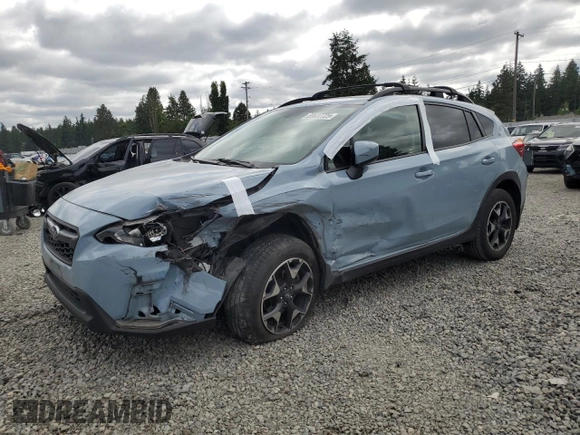 2020 Subaru Crosstrek Premium with VIN JF2GTAPC5L8243550, listed as a Copart auction lot 59637725 with 76,627 mi miles and Salvage title. Bid and sale history available at DreamBid. Image 1.