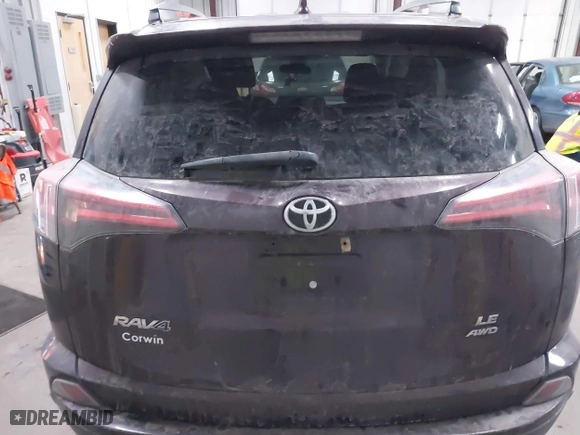 2018 Toyota RAV4 LE with VIN 2T3BFREVXJW737378, listed as a IAAI auction lot 41355320 with 58,609 mi miles. Bid and sale history available at carsss.com. Image 16.