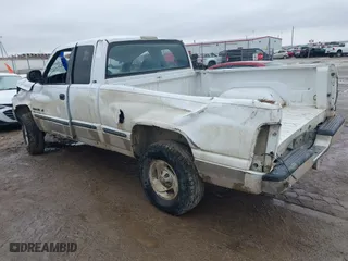 1999 Dodge Ram 1500 with VIN 1B7HF13Z3XJ651659, listed as a IAAI auction lot 41717323 with 230,729 mi miles. Bid and sale history available at carsss.com. Image 3.