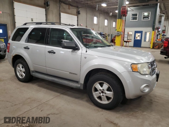 2008 Ford Escape XLT с VIN 1FMCU93128KD51496, выставлен на аукционе Copart как лот 57055865 с пробегом 204 224 миль миль и Списание • Salvage title. История ставок и продаж доступна на DreamBid. Изображение 4.