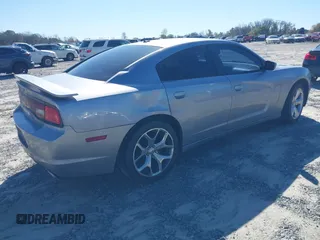 2014 Dodge Charger SXT with VIN 2C3CDXHG6EH166994, listed as a IAAI auction lot 41801739 with 163,314 mi miles. Bid and sale history available at carsss.com. Image 4.