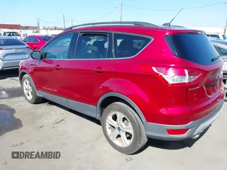 2015 Ford Escape SE with VIN 1FMCU0GX3FUC80207, listed as a IAAI auction lot 41665897 with 153,891 mi miles. Bid and sale history available at carsss.com. Image 3.