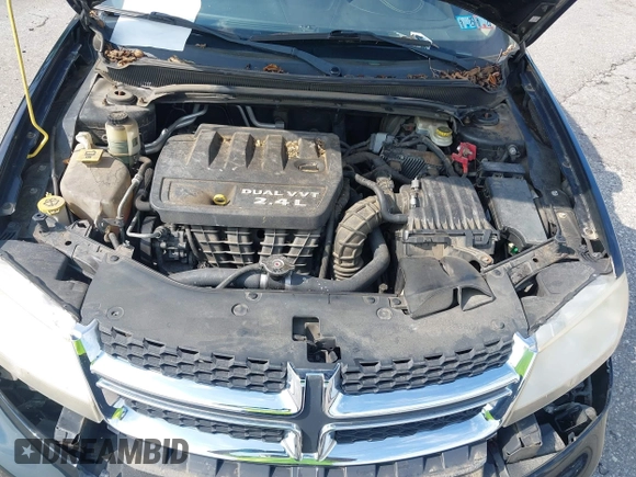 2013 Dodge Avenger SXT with VIN 1C3CDZCB7DN650959, listed as a IAAI auction lot 42592881 with 107,652 mi miles and . Bid and sale history available at DreamBid. Image 10.