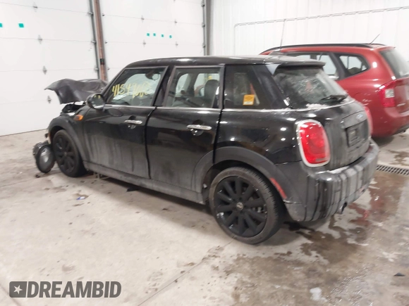 2017 MINI Hardtop 4 Door Cooper with VIN WMWXU1C34H2F78228, listed as a IAAI auction lot 41549060 with 49,393 mi miles. Bid and sale history available at carsss.com. Image 3.