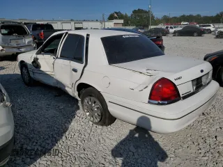 2004 Ford Crown Victoria LX z VIN 2FDFP74W34X164453, wystawiony jako Copart lot #75922204 z przebiegiem 103 546 mil mil oraz Szkoda całkowita • Salvage title. Historia ofert i sprzedaży dostępna na DreamBid. Obrazek 2.