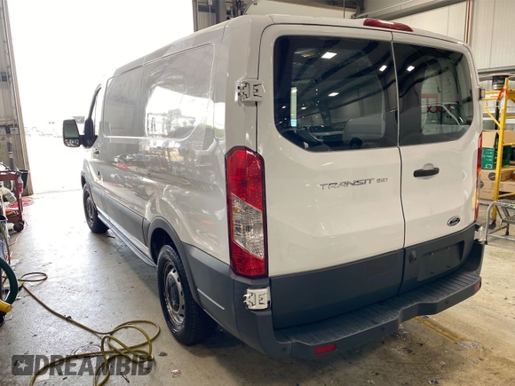 2016 Ford Transit Cargo z VIN 1FTYE1YM3GKB18575, wystawiony jako IAAI lot #42734024 z przebiegiem 186 138 mil mil oraz . Historia ofert i sprzedaży dostępna na DreamBid. Obrazek 18.