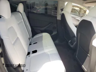 2024 Tesla Model Y Performance z VIN 7SAYGDEF0RF024089, wystawiony jako Copart lot #53981865 z przebiegiem Nie podano mil oraz Szkoda całkowita • Salvage title. Historia ofert i sprzedaży dostępna na DreamBid. Obrazek 10.