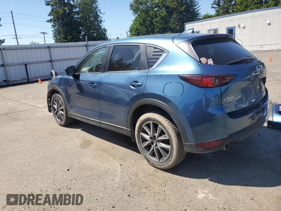 2018 Mazda CX-5 Touring z VIN JM3KFBCM2J1363310, wystawiony jako Copart lot #58969135 z przebiegiem 86 831 mil mil oraz Szkoda całkowita • Salvage title. Historia ofert i sprzedaży dostępna na DreamBid. Obrazek 2.