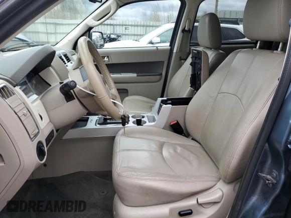 2011 Mercury Mariner with VIN 4M2CN8B76BKJ06364, listed as a Copart auction lot 50040745 with 153,675 mi miles and Salvage title. Bid and sale history available at DreamBid. Image 7.