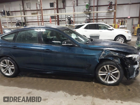 2014 BMW 3 Series 328i Gran Turismo xDrive with VIN WBA3X5C5XED557668, listed as a IAAI auction lot 41728522 with 123,393 mi miles and . Bid and sale history available at DreamBid. Image 13.