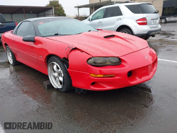 1999 Chevrolet Camaro Z28 z VIN 2G1FP22G2X2112215, wystawiony jako IAAI lot #41459474 z przebiegiem 106 832 mil mil oraz . Historia ofert i sprzedaży dostępna na DreamBid. Obrazek 6.