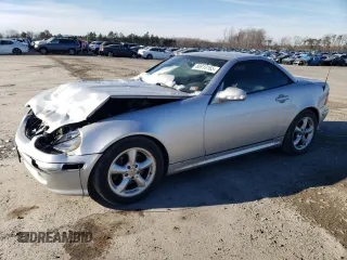 2002 Mercedes-Benz SLK-Class 3.2L with VIN WDBKK65F32F243268, listed as a Copart auction lot 88910165 with 156,021 mi miles and Salvage Title. Bid and sale history available at carsss.com. Image 1.