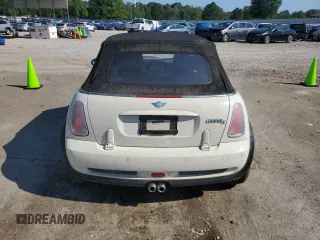 2006 MINI Convertible S с VIN WMWRH33546TF85908, выставлен на аукционе Copart как лот 61363025 с пробегом 105 053 миль миль и Списание • Salvage title. История ставок и продаж доступна на DreamBid. Изображение 6.
