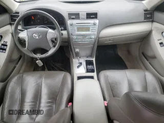 2007 Toyota Camry с VIN JTNBB46K373039706, выставлен на аукционе Copart как лот 57592125 с пробегом 298 836 миль миль и Списание • Salvage title. История ставок и продаж доступна на DreamBid. Изображение 8.