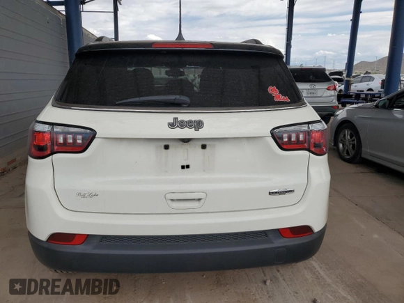2019 Jeep Compass Latitude with VIN 3C4NJCBB3KT726119, listed as a Copart auction lot 65382915 with 132,313 mi miles and Salvage title. Bid and sale history available at DreamBid. Image 6.