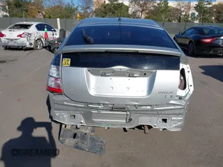 2005 Toyota Prius z VIN JTDKB20UX53080527, wystawiony jako IAAI lot #41831153 z przebiegiem 256 327 mil mil oraz . Historia ofert i sprzedaży dostępna na DreamBid. Obrazek 17.