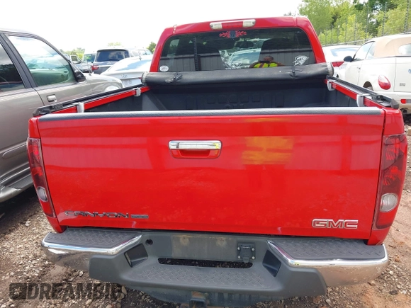 2010 GMC Canyon SLE1 z VIN 1GTDSCDE0A8137817, wystawiony jako IAAI lot #42178917 z przebiegiem 208 192 mil mil oraz . Historia ofert i sprzedaży dostępna na DreamBid. Obrazek 16.