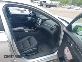 2014 Chevrolet Impala LT with VIN 2G1125S3XE9114130, listed as a IAAI auction lot 42128077 with 209,391 mi miles and . Bid and sale history available at DreamBid. Image 5.
