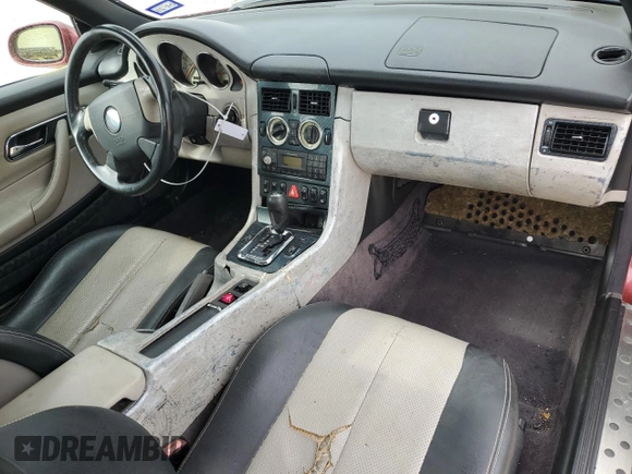 1999 Mercedes-Benz SLK-Class with VIN WDBKK47F0XF132802, listed as a Copart auction lot 69818544 with 123,026 mi miles and Salvage Title. Bid and sale history available at carsss.com. Image 8.