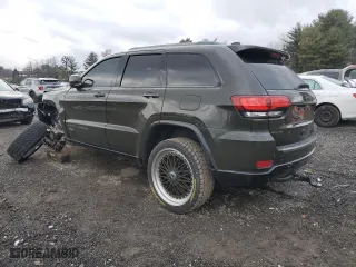 2016 Jeep Grand Cherokee Limited 75th Anniversary with VIN 1C4RJFBG5GC441102, listed as a Copart auction lot 87450344 with 130,811 mi miles and Salvage Title. Bid and sale history available at carsss.com. Image 2.