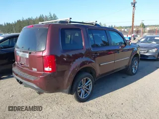 2014 Honda Pilot Touring with VIN 5FNYF4H93EB502117, listed as a IAAI auction lot 42086774 with 111,003 mi miles and . Bid and sale history available at carsss.com. Image 4.