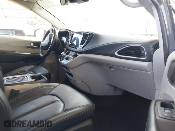 2023 Chrysler Pacifica Hybrid Touring L with VIN 2C4RC1L73PR509853, listed as a IAAI auction lot 41690872 with 83,014 mi miles and . Bid and sale history available at DreamBid. Image 5.