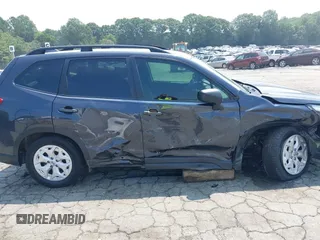 2019 Subaru Forester with VIN JF2SKACC6KH569407, listed as a IAAI auction lot 42682102 with 100,322 mi miles and . Bid and sale history available at DreamBid. Image 14.