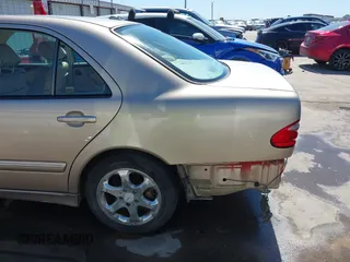 2002 Mercedes-Benz E-Class with VIN WDBJF65J42B394017, listed as a IAAI auction lot 41706917 with 188,883 mi miles. Bid and sale history available at carsss.com. Image 19.