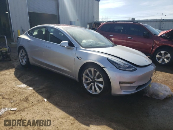 2018 Tesla Model 3 Long Range Battery with VIN 5YJ3E1EB1JF069197, listed as a Copart auction lot 48069465 with Not Provided miles and Salvage Title. Bid and sale history available at DreamBid. Image 4.