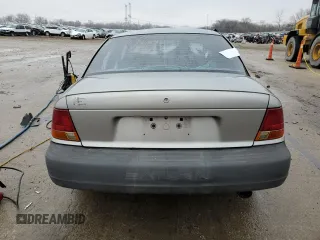 1998 Saturn SL z VIN 1G8ZG5288WZ306574, wystawiony jako Copart lot #86627384 z przebiegiem Nie podano mil oraz Nie do naprawy. Historia ofert i sprzedaży dostępna na DreamBid. Obrazek 6.