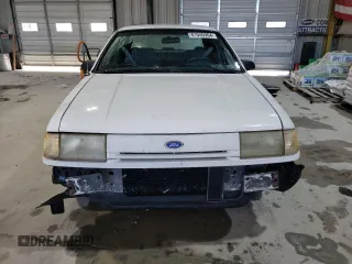 1993 Ford Tempo GL z VIN 2FAPP36X2PB104844, wystawiony jako Copart lot #81046964 z przebiegiem 5951 mil mil oraz Szkody całkowita. Historia ofert i sprzedaży dostępna na DreamBid. Obrazek 5.